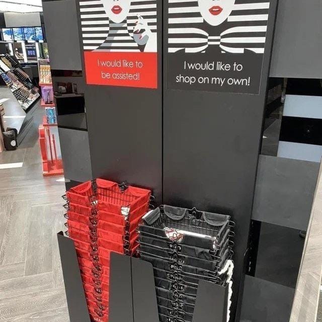 A black and red sign with a couple of bagsAI-generated content may be incorrect.